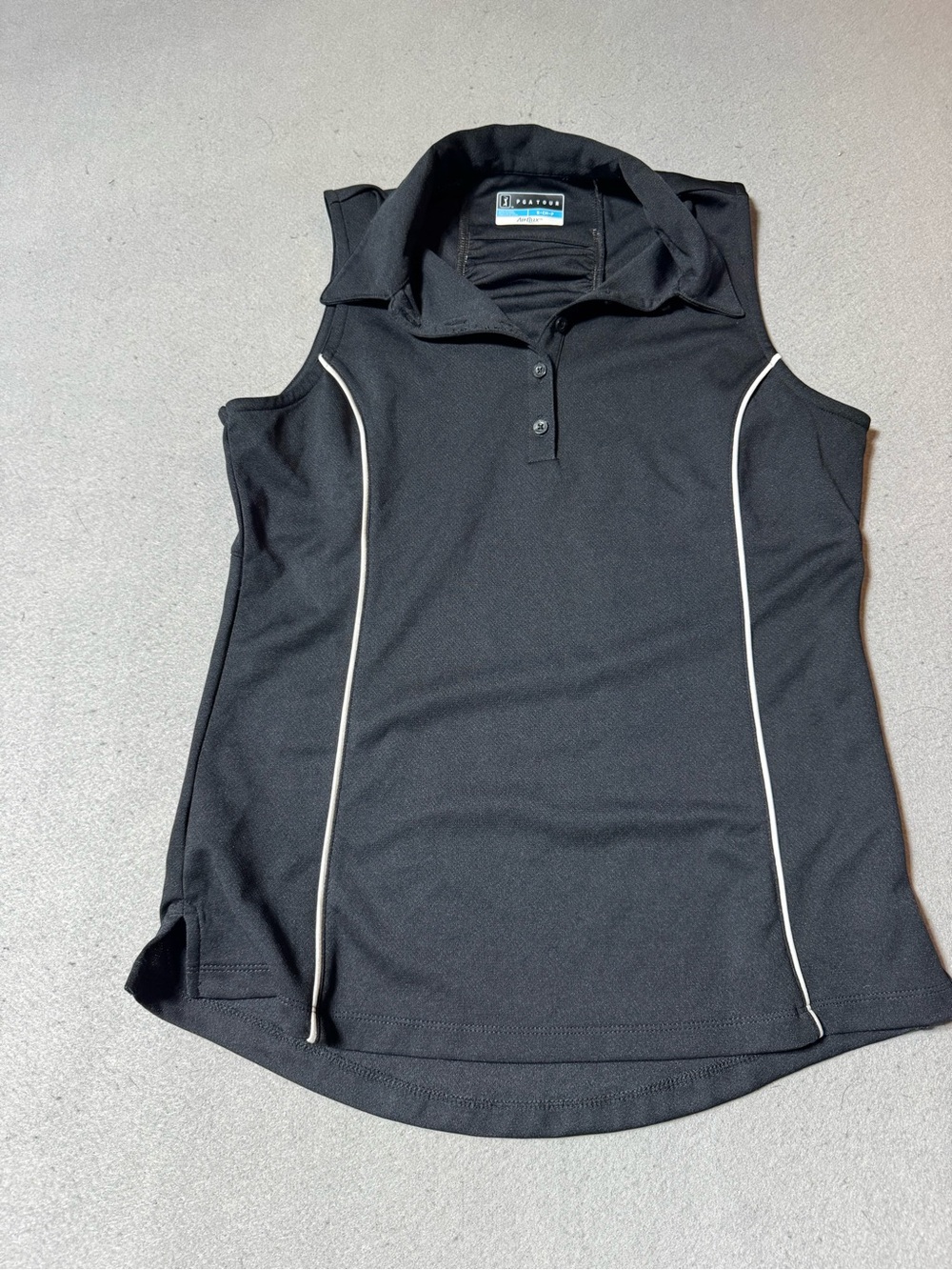 Pebble Beach Women’s Black Sleeveless Polo with White Piping
